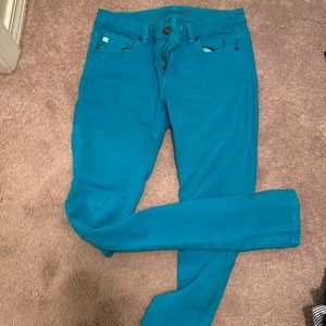 Bright teal Michael Kors skinny jeans